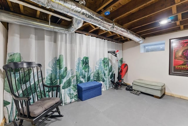 below grade area featuring baseboards