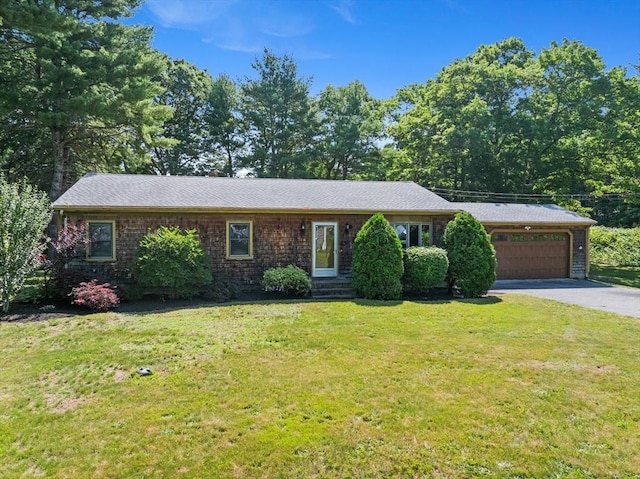 13 Abraham Ave, Freetown, MA 02717 - ranch-style home with a garage, asphalt driveway, and a front lawn