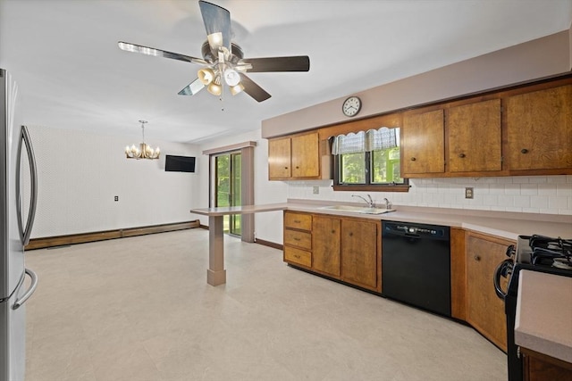 13 Abraham Ave, Freetown, MA 02717 - kitchen featuring black appliances, brown cabinetry, ceiling fan, light countertops, and a chandelier