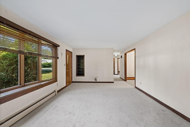 13 Abraham Ave, Freetown, MA 02717 - spare room with baseboard heating and light carpet