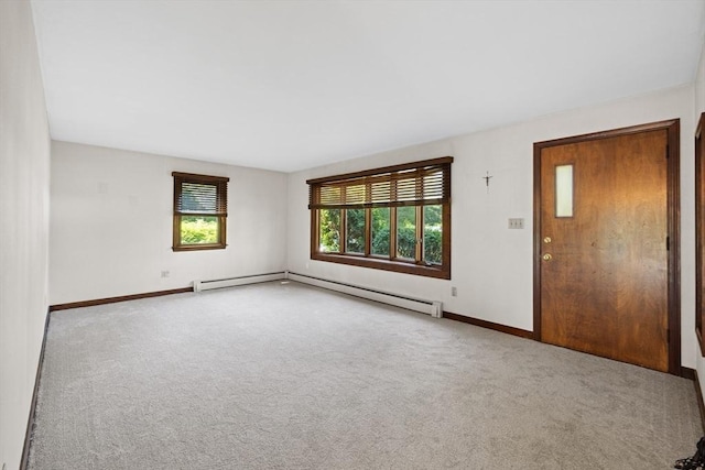 13 Abraham Ave, Freetown, MA 02717 - carpeted spare room featuring baseboard heating and baseboards