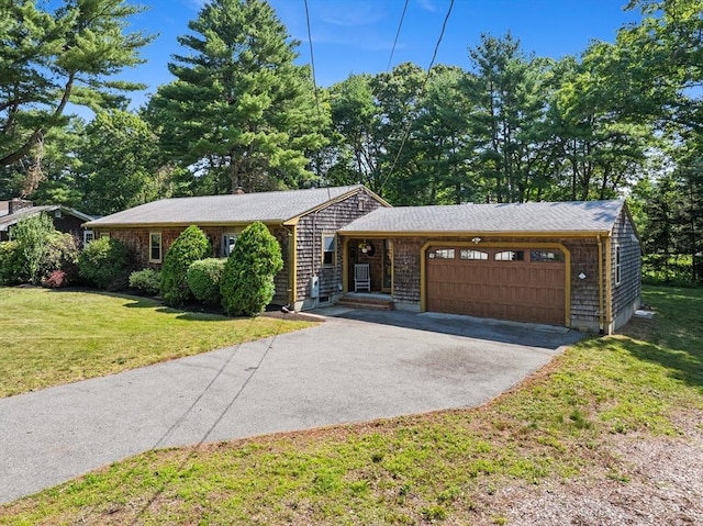 13 Abraham Ave, Freetown, MA 02717 - single story home with a garage, asphalt driveway, and a front lawn