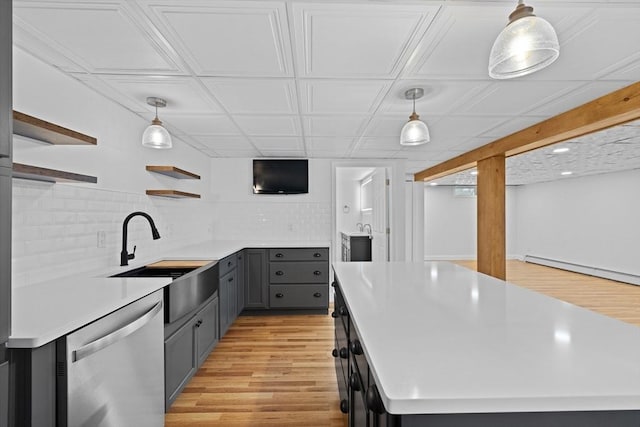 13 Abraham Ave, Freetown, MA 02717 - kitchen with stainless steel dishwasher, open shelves, a baseboard radiator, gray cabinets, and light wood-style floors