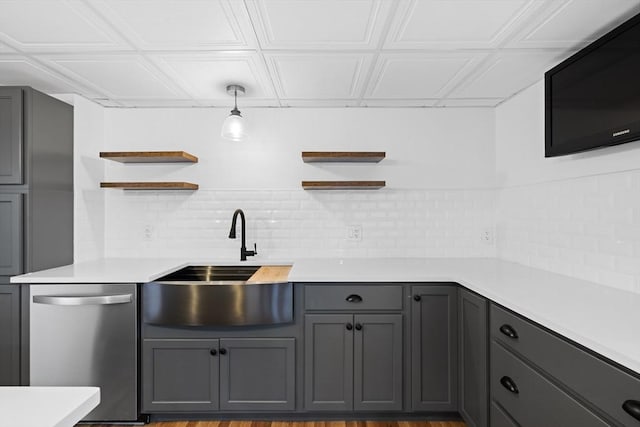 13 Abraham Ave, Freetown, MA 02717 - kitchen with stainless steel dishwasher, open shelves, decorative backsplash, and an ornate ceiling