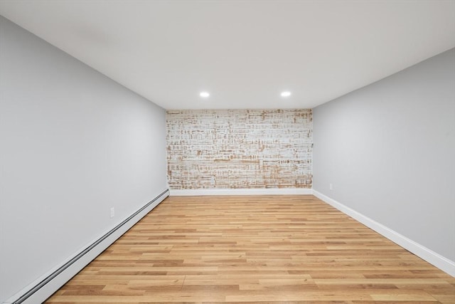 13 Abraham Ave, Freetown, MA 02717 - empty room featuring a baseboard heating unit, light wood-style floors, and recessed lighting