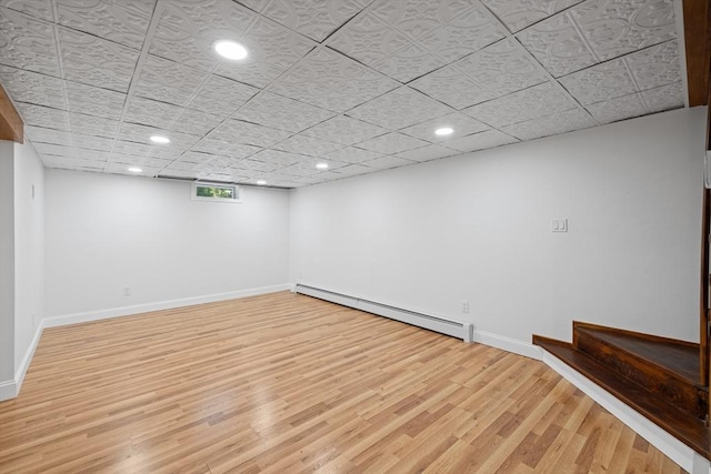 13 Abraham Ave, Freetown, MA 02717 - basement with a baseboard radiator, light wood finished floors, and recessed lighting