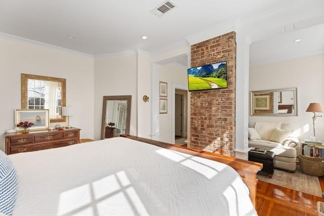 bedroom featuring crown molding, recessed lighting, wood finished floors, and visible vents