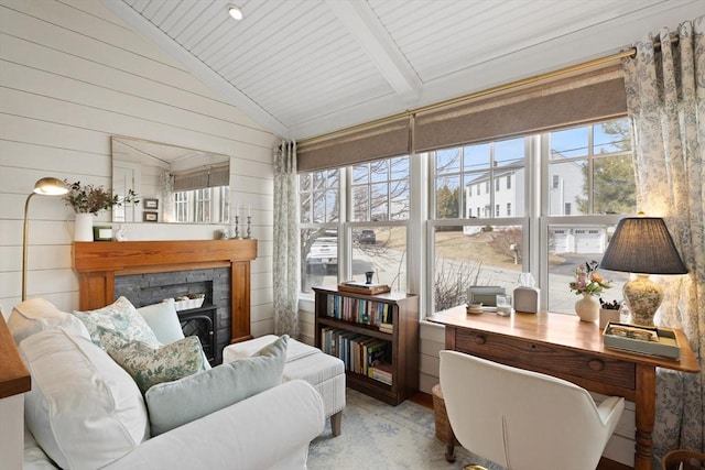 sunroom / solarium with lofted ceiling with beams