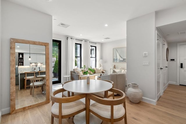 dining area featuring light hardwood / wood-style floors