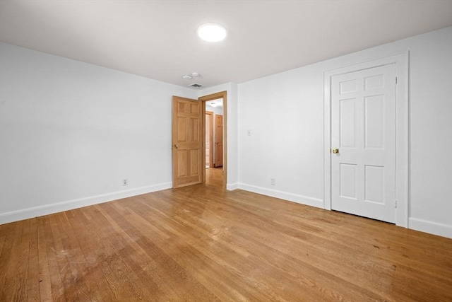 191 Speen, Natick, MA 01760 - unfurnished bedroom featuring light wood-style floors and baseboards