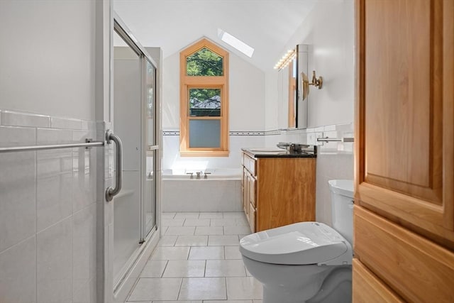 191 Speen, Natick, MA 01760 - full bathroom featuring a skylight, toilet, tile patterned flooring, a stall shower, and a garden tub