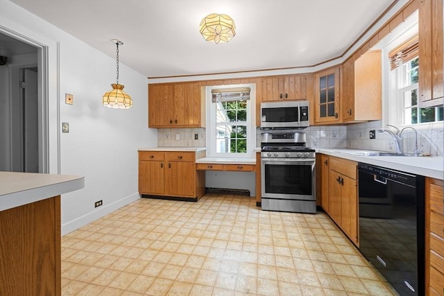 191 Speen, Natick, MA 01760 - kitchen with stainless steel appliances, light countertops, a sink, and light floors