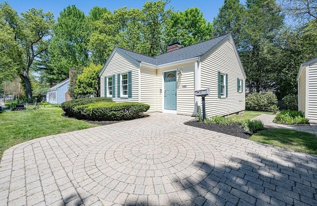 191 Speen, Natick, MA 01760 - view of front facade featuring a front yard and a chimney