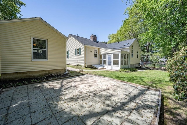191 Speen, Natick, MA 01760 - back of property with a patio area and a sunroom