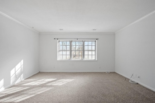 carpeted empty room featuring ornamental molding