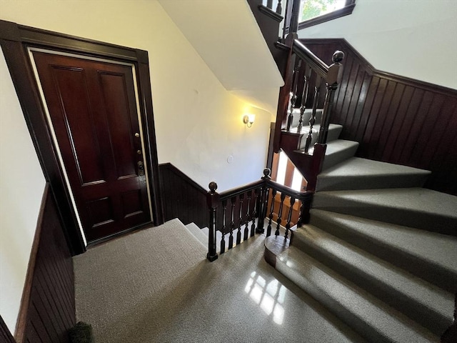 98 Boylston St Unit 1, Brookline, MA 02445 - stairs with a wainscoted wall and carpet floors