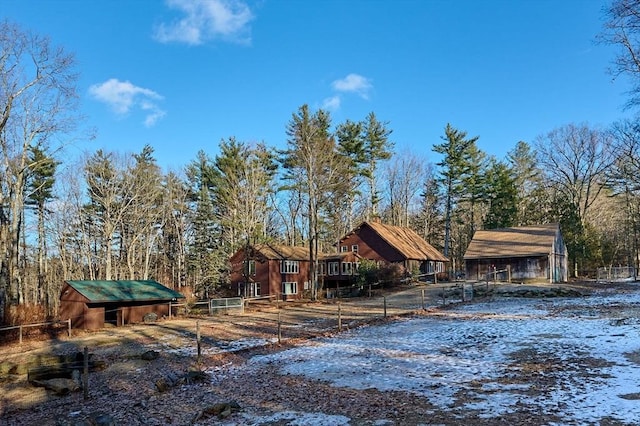 exterior space featuring an outdoor structure