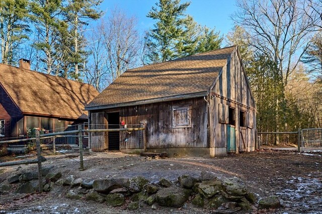 view of front of home with an outbuilding