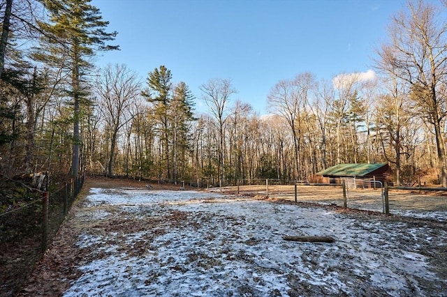 view of yard layered in snow