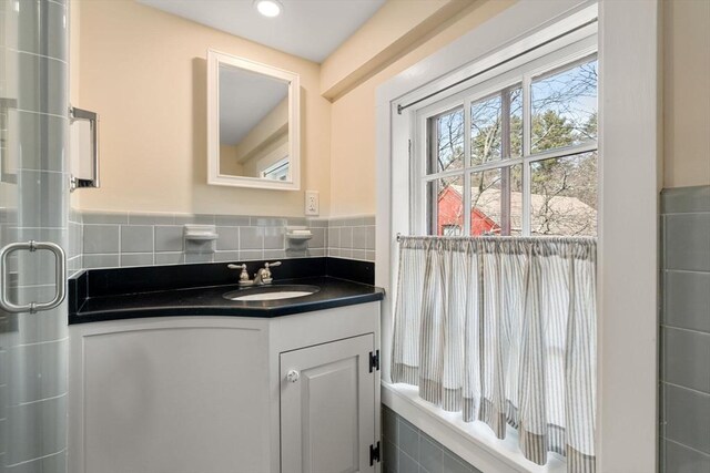 bathroom with recessed lighting and vanity