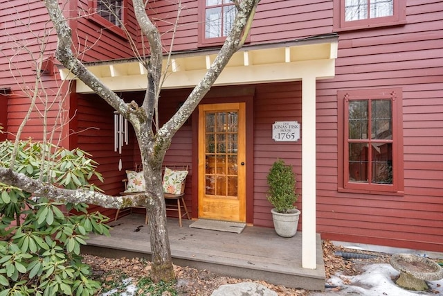 entrance to property with covered porch