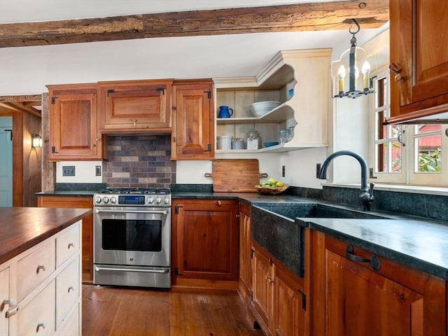 kitchen with a sink, stainless steel range with gas cooktop, beam ceiling, dark wood-style floors, and tasteful backsplash