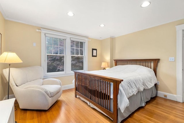 24 Aspen Ave, Newton, MA 02466 - bedroom with light wood finished floors, recessed lighting, and crown molding
