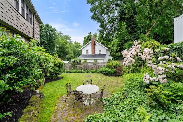 24 Aspen Ave, Newton, MA 02466 - view of yard featuring a patio and outdoor dining space