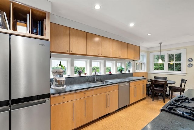 24 Aspen Ave, Newton, MA 02466 - kitchen featuring appliances with stainless steel finishes, light floors, recessed lighting, dark countertops, and pendant lighting