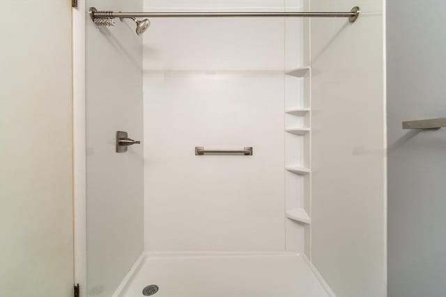 bathroom with a stall shower