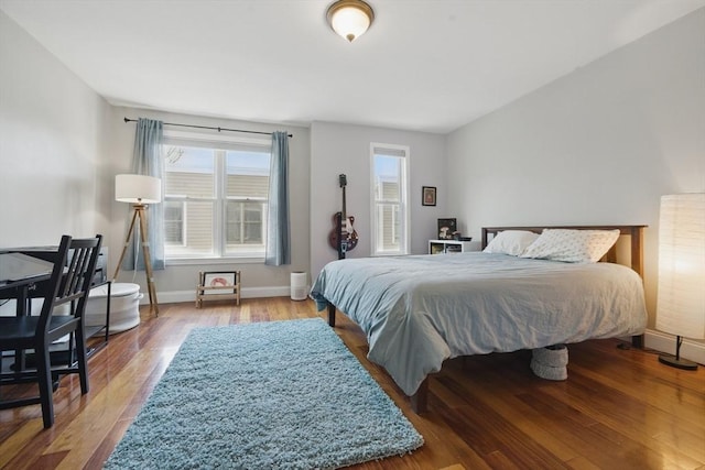 239 Prospect St Unit 2, Cambridge, MA 02139 - bedroom featuring wood finished floors and baseboards