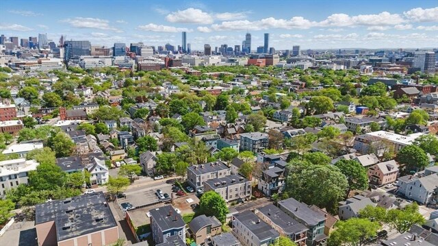 239 Prospect St Unit 2, Cambridge, MA 02139 - aerial view of property and surrounding area featuring a view of skyline