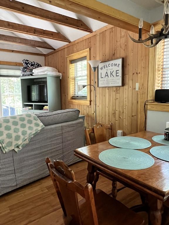 10 Kibbe Point Rd, Otis, MA 01253 - dining space featuring wood walls and wood finished floors