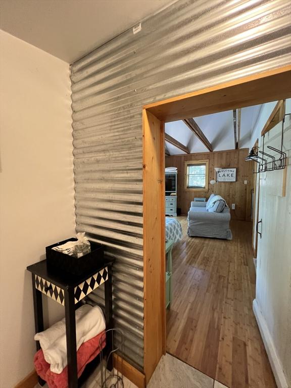 10 Kibbe Point Rd, Otis, MA 01253 - bedroom featuring wood-type flooring and wood walls