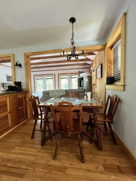 10 Kibbe Point Rd, Otis, MA 01253 - dining room with a chandelier and light wood-type flooring