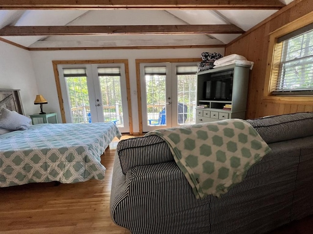 10 Kibbe Point Rd, Otis, MA 01253 - bedroom featuring french doors, access to outside, multiple windows, and wood walls