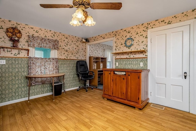 119 Clark St, Clinton, MA 01510 - office space featuring wallpapered walls, a ceiling fan, light wood-style floors, and baseboards