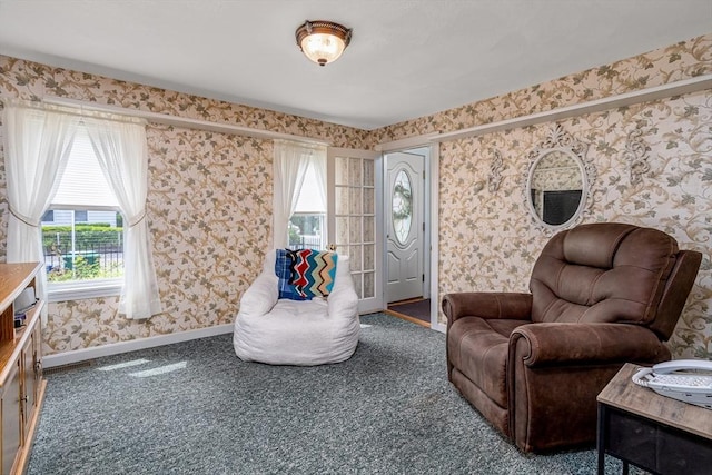 119 Clark St, Clinton, MA 01510 - living room featuring wallpapered walls, baseboards, plenty of natural light, and carpet floors