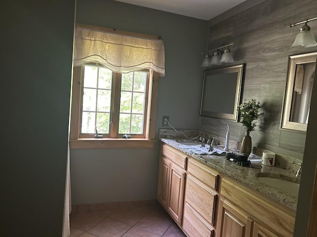 210 Wales Rd, Monson, MA 01057 - bathroom with double vanity, tile patterned floors, and baseboards
