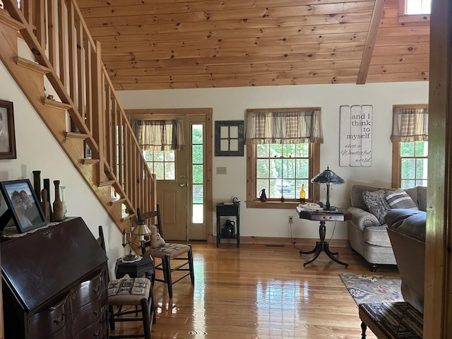 210 Wales Rd, Monson, MA 01057 - foyer entrance featuring vaulted ceiling, stairs, light wood finished floors, wood ceiling, and baseboards