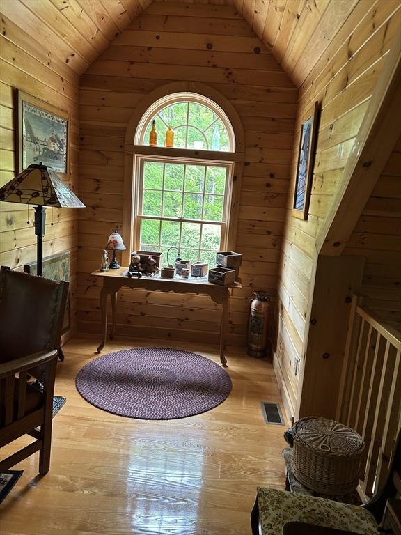 210 Wales Rd, Monson, MA 01057 - office area featuring vaulted ceiling, wood walls, wood ceiling, and hardwood / wood-style flooring