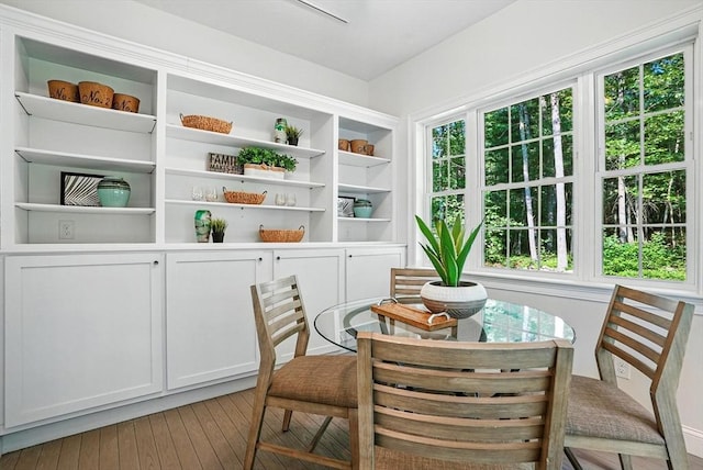 83 Partridge Hill Rd, Sutton, MA 01590 - dining space with light wood finished floors and built in shelves