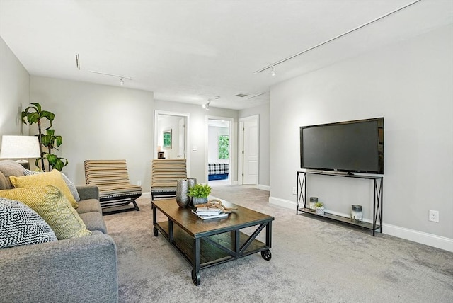 83 Partridge Hill Rd, Sutton, MA 01590 - living room featuring rail lighting and carpet flooring