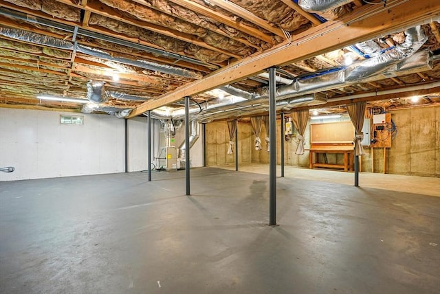 83 Partridge Hill Rd, Sutton, MA 01590 - unfinished basement featuring heating unit and electric panel