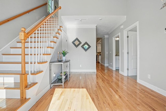 83 Partridge Hill Rd, Sutton, MA 01590 - staircase featuring crown molding and wood finished floors