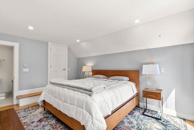 120 Norway St Unit 12, Boston, MA 02115 - bedroom featuring lofted ceiling, baseboards, recessed lighting, and wood finished floors