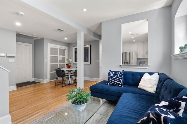 120 Norway St Unit 12, Boston, MA 02115 - living room featuring light wood finished floors, baseboards, and recessed lighting