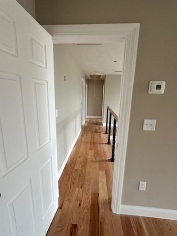 corridor featuring light wood-type flooring