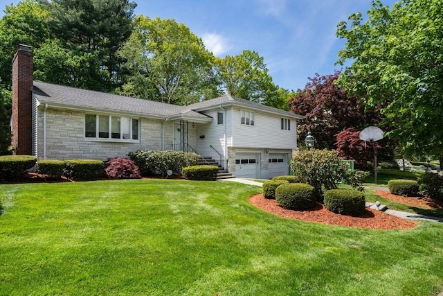61 Sevland Rd, Newton, MA 02459 - tri-level home with a garage, a chimney, a front lawn, and stone siding