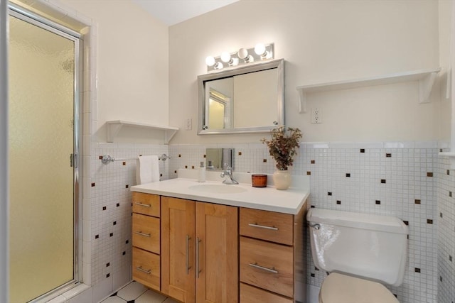 61 Sevland Rd, Newton, MA 02459 - full bath with tile walls, a stall shower, vanity, tile patterned flooring, and wainscoting